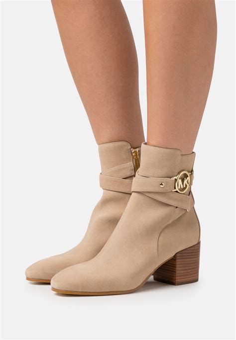 michael kors logo ankle boots|Michael Kors cowboy boots.